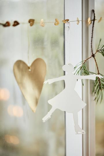 Ib Laursen Scherenschnitt Schlittschuhtänzerin