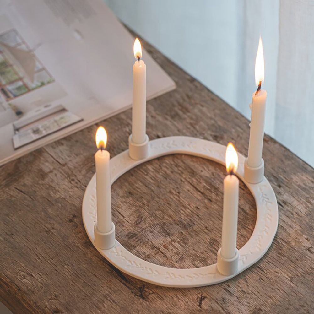 Räder Kerzenkranz Blätter